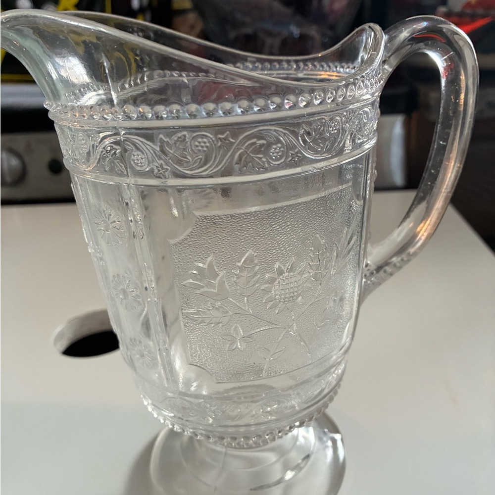 Elegant Clear Glass Pitcher with Floral Design